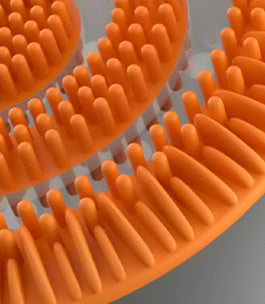 Close-up of the orange silicone ribs and bristles